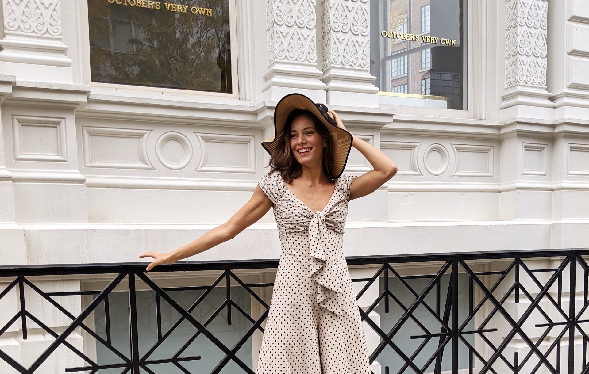Woman wearing polka dot jumpsuit