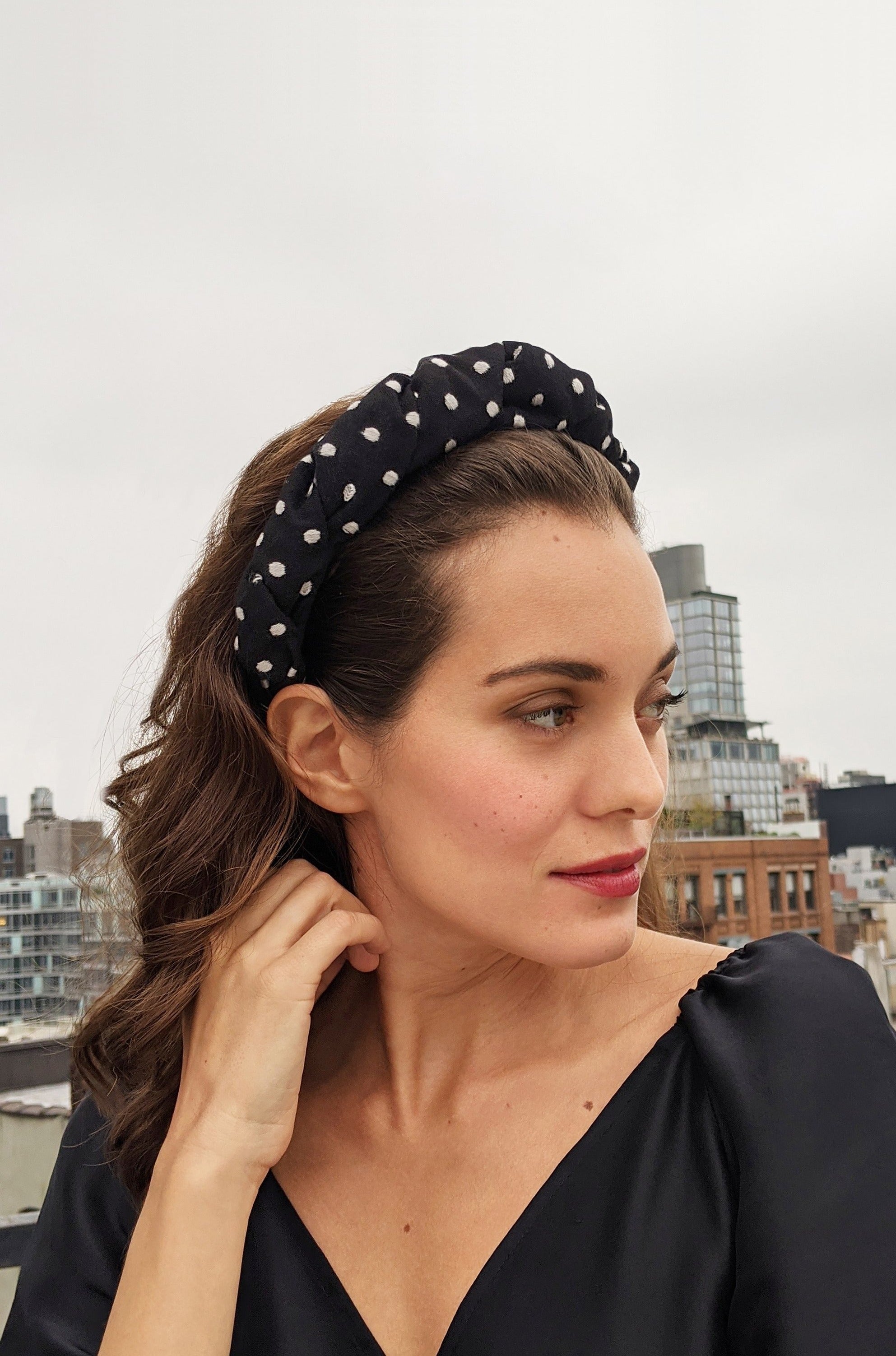 woman wearing black polka dot silk headband handwoven
