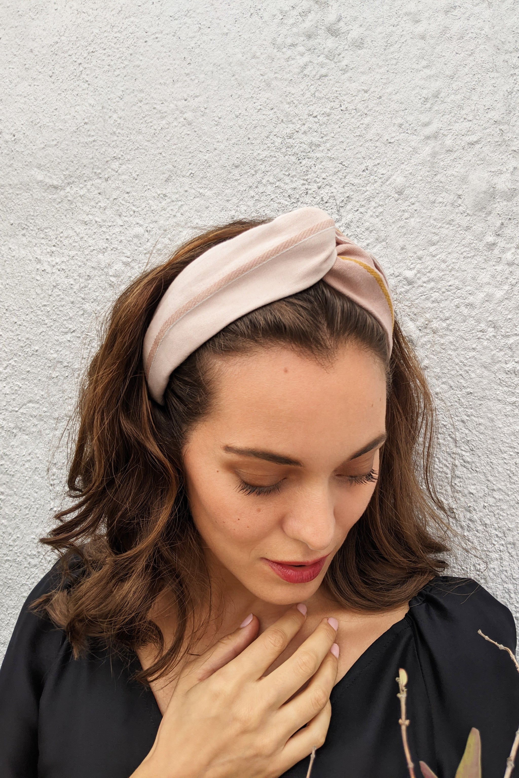 woman modelling pink silk headband two tones of same fabric